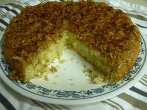 Light cake with broiled coconut frosting